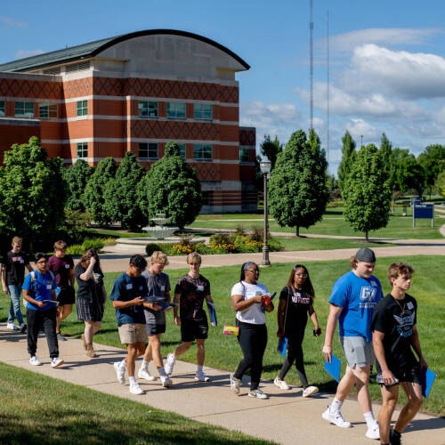 A group of students walking outside on GVSU's Valley Campus.